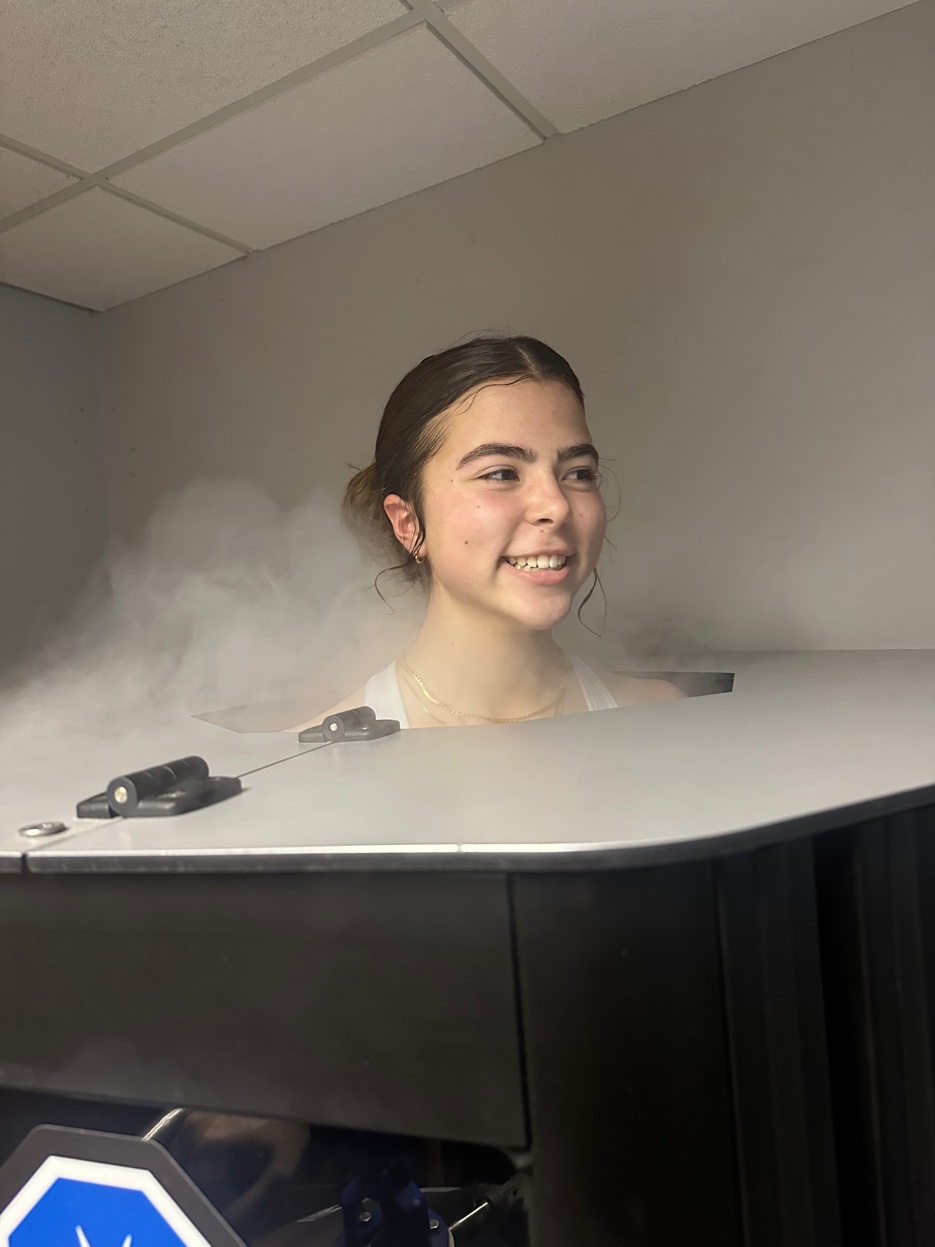 Client in cryotherapy chamber