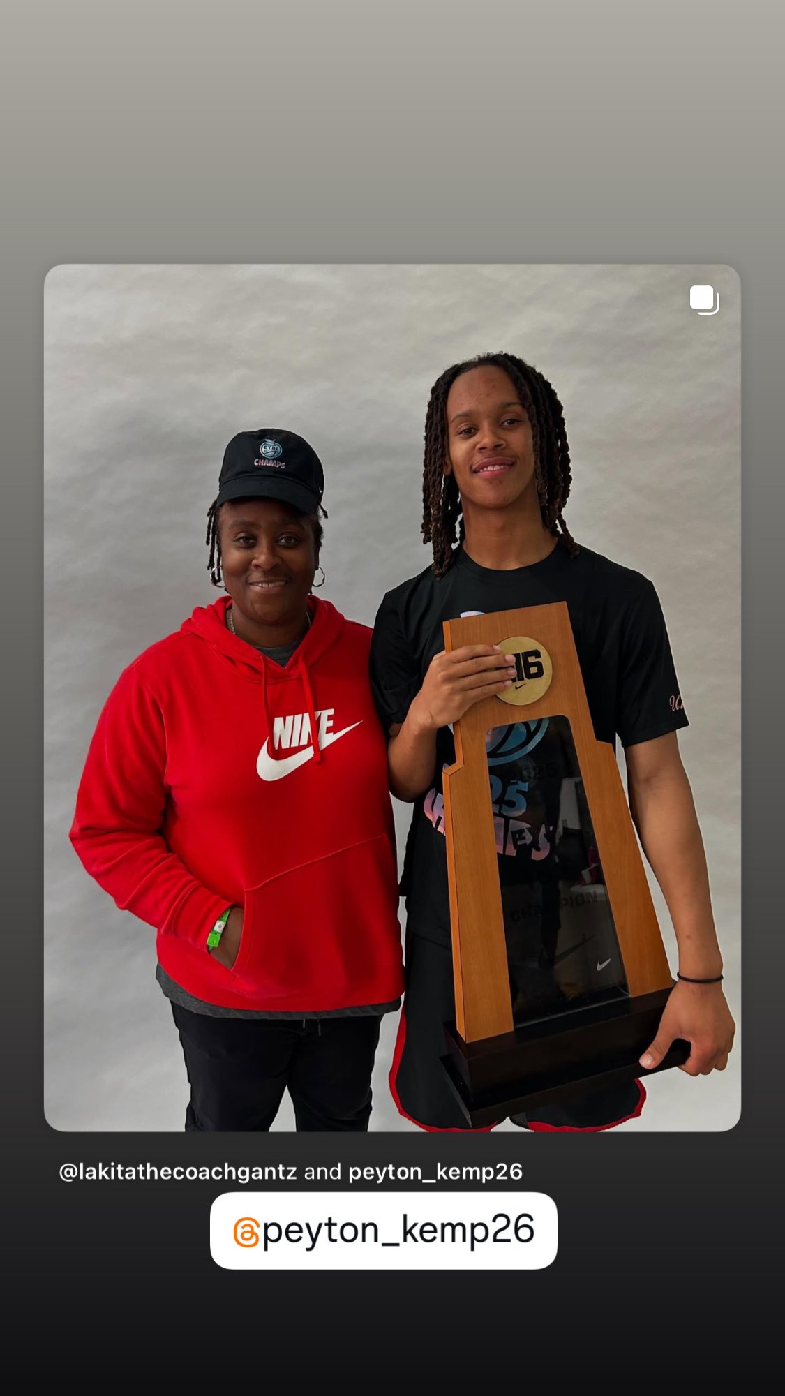 AIR athlete with championship trophy